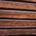 Rustic Wood Panel Wall with Natural Grain Texture and Horizontal Wooden Planks