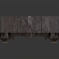 Decorative Medieval Style Stone Arch Featuring Intricate Metal Door And Orange Accents