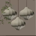 Elegant Warm Yellow Fabric Lanterns Hanging With Bamboo Leaves And Soft Glow