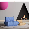 Blue Bean Bag Chair And Beige Footstool By Triangle Fireplace With Pink Sphere Decor