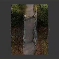Scenic Stone Bridge With Slate Path Metal Railings Stone Pillars Green Vegetation And Fallen Leaves