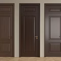Three Dark Brown Wooden Hinged Doors With Various Panel Designs And Golden Handles