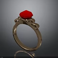 Elegant Gold Ring With Red Gemstone And Decorative Metal Details