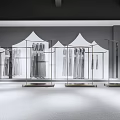 Modern Clothing Store Interior With Open Display Racks And Hanging Apparel