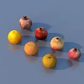 Colorful Fresh Assorted Fruits Pomegranates Oranges And Lemons On Blue Surface