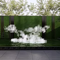 Modern Outdoor Landscape Sculpture With White Geometric Structure Green Wall Grass And Stone Slab Floor
