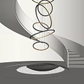 Sleek Modern Spiral Staircase With Multiple Hanging Circular Rings And Pebble Decorated Platform