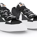 Nike Black And White Low Top Sneakers With White Sole And Lace Up Design
