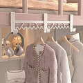 Cozy Modern Bedroom Clothes Rack With Hanging Clothes Headphones Handbag And Stuffed Toy