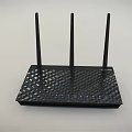 Black Wireless Router with Three Antennas Checkerboard Pattern and Indicator Lights 3d model