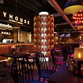 Industrial Bar Interior Design With Brick Walls Pendant Lights And Neon Signs