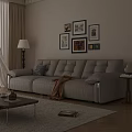 Cream Colored Leather Three Seater Sofa with Throw Blanket and Wall Art in Living Room