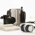 Modern Decorative Accessories Collection Featuring Camera Books Laptop Headphones And Tray