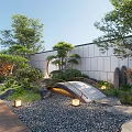 Traditional Courtyard Garden With Stone Bridge Pebble Ground Lanterns Lush Trees And Wooden Pathway