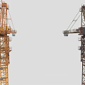 Yellow And Brown Tower Cranes With Extended Booms Operating Cabs And Steel Structures