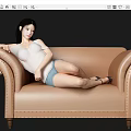 Young Woman Lying On Beige Leather Sofa With White Tank Top Blue Shorts Black Shoes