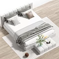 Modern Minimalist Double Bed With White Frame Gray Brown Pillows White Bench Green Plant And Wooden Floor