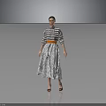 Stylish Woman In Striped Top And Patterned Skirt With Belt Standing Against Grey Background