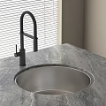 Modern Kitchen Stainless Steel Sink With Black Faucet On Marble Countertop