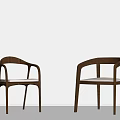 Wooden Chairs With Curved Arms And White Cushions Against Light Gray Wall