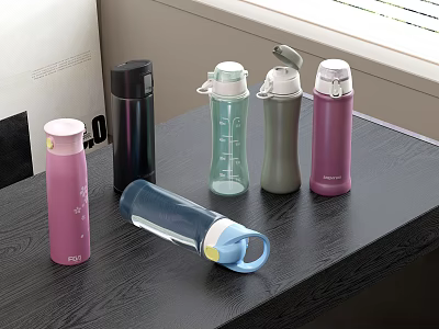 Colorful Water Bottles in Pink Black Green Gray Purple Blue on Black Table 3d model