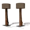 Two Modern Floor Lamps With Natural Wooden Bases And Fabric Shades