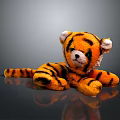 Orange Black Striped Tiger Plush Toy With White Ears Lying On Surface 3d model