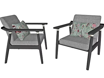 Two Gray Cushioned Accent Chairs with Black Wooden Arms and Floral Pillows 3d model