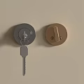 Silver and Golden Lock Cylinders with Key Mounted on Interior Wall 3d model
