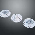 Three Circular Equipment Devices With White Bases Black Dots And Various Components 3d model