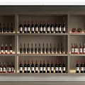 Modern Wooden Wine Cabinet With Multiple Shelves Illuminated Lighting And Various Wine Bottles