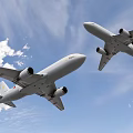 Two Passenger Planes Flying Together in Clear Blue Sky with White Clouds