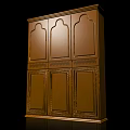 Elegant Ornate Golden Wardrobe With Traditional Carved Details And Panel Doors