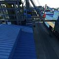 Large Scale Industrial Plant With Piping Systems Buildings Surrounding River And Roads