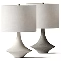Modern Minimalist Table Lamps With Light Colored Lampshades And Geometric Bases