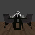 Dark Colored Dining Table Set With Chairs Tableware And Antler Decor On Wooden Floor