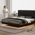 Modern Double Bed with Black Tufted Headboard Gray Bedding Nightstands Plant Lamp Wooden Floor