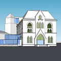 White Gothic Style Building With Arched Windows And Blue Entrance Design