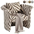 Stylish Single Sofa With Zebra Pattern Brown And White Upholstery And Gray Blanket