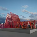 Modern Commercial Complex With Red Triangular Structures And Glass Facades Under Sunset Sky