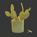 Green Cactus Plant with Prickly Pads in Blue Textured Ceramic Pot Placed on Dark Background