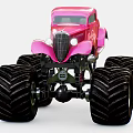 Pink Toy Monster Truck With Large Black Tires And Candy Themed Design