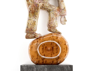 Decorative Ornament Set With Figure In Speckled Pants On Brown Circular Object And Black Base 3d model