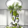 Art Installation Featuring Hanging Stones And Green Plants With Circular Ceiling Light On White Wall