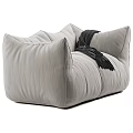 Cozy Modern Light Gray Fabric Two-Seater Sofa With Stitched Details And Dark Fringe Blanket