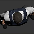 Man in Blue Vest White Shirt Gray Pants and Black Shoes Standing Against Gray Background