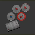 Stacked Silver Metal Storage Drums With Red Blue Lids For Household Use