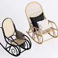 Black and Light Colored Woven Rocking Chairs with Blanket and Pillows for Home Decor