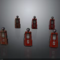 Multiple Vintage Red Fuel Pumps Showcased In Classic Retro Setup