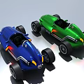 Green And Blue Vintage Race Cars With Open Cockpits Yellow Headlights And Black Tires